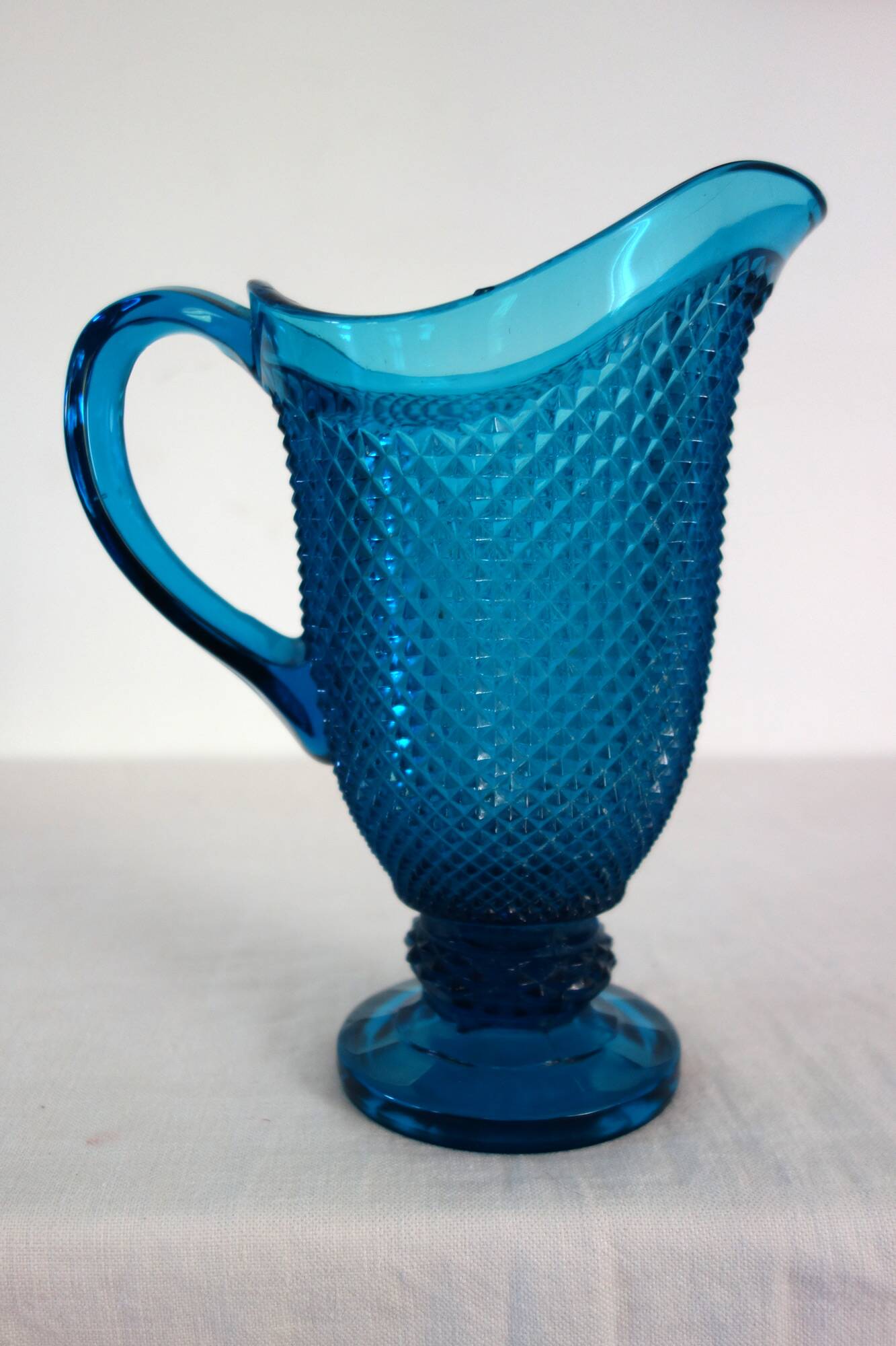 Vintage cut glass blue pitcher