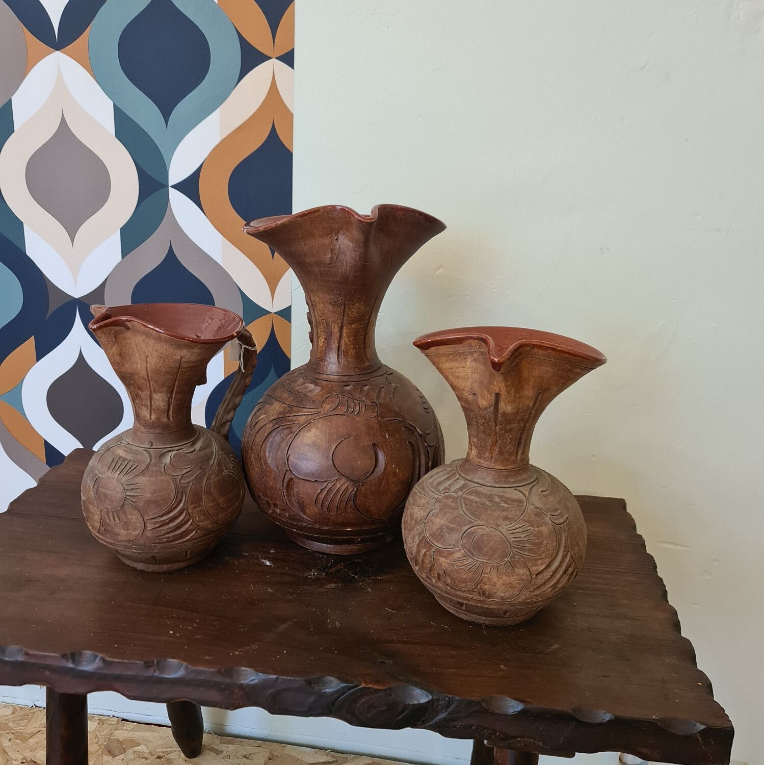 Set of carved terracotta pitchers