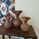 Set of chiselled terracotta jugs