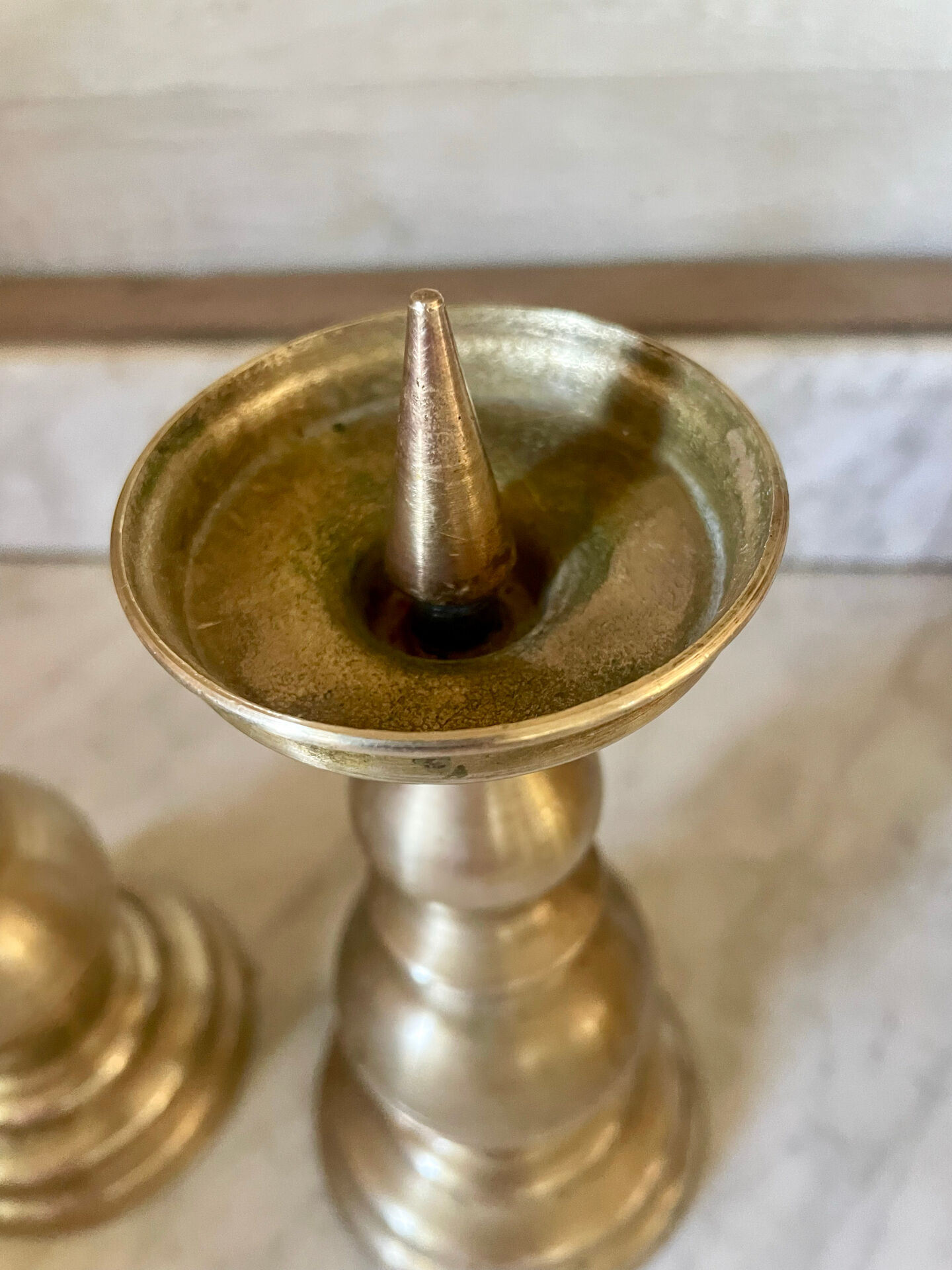 Pair of solid brass candlesticks from the 19th century.