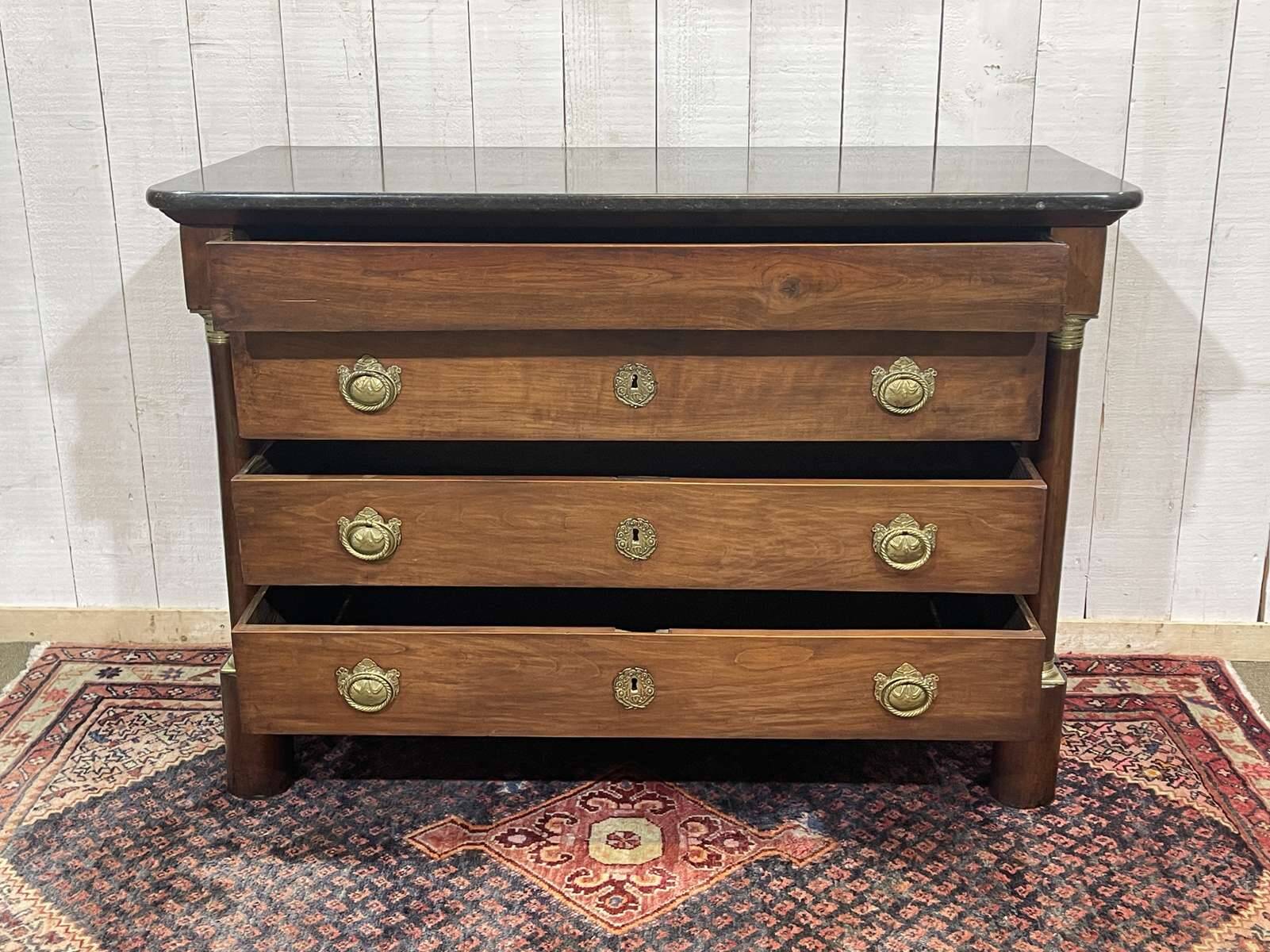 19th century Empire chest of drawers in cherry wood and black marble