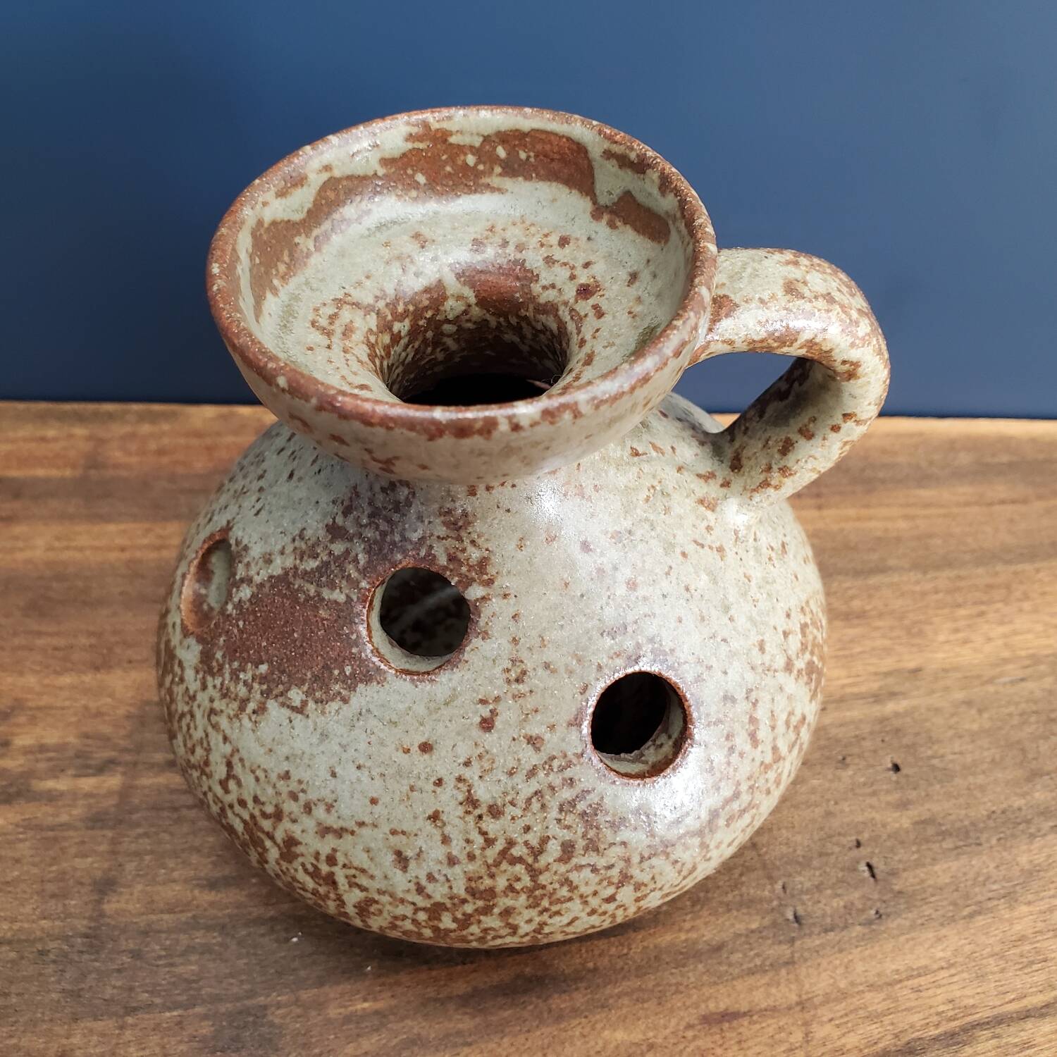 Stoneware cellar rat candle holder