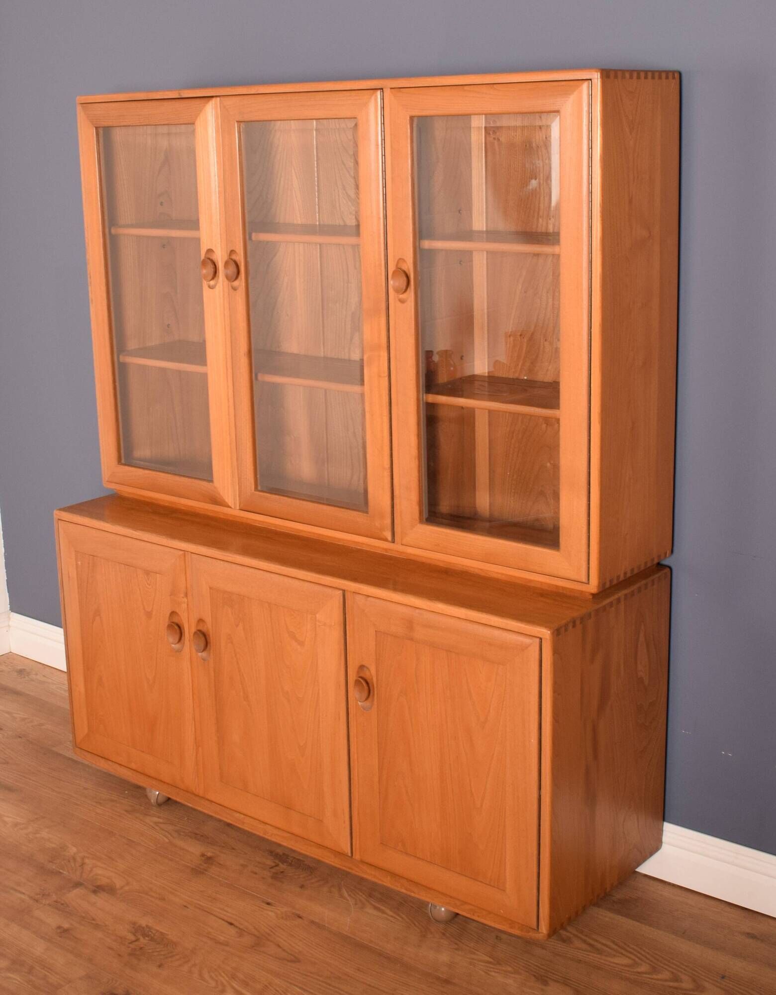 Ercol elm windsor model 806,803 glazed three door cabinet dresser
