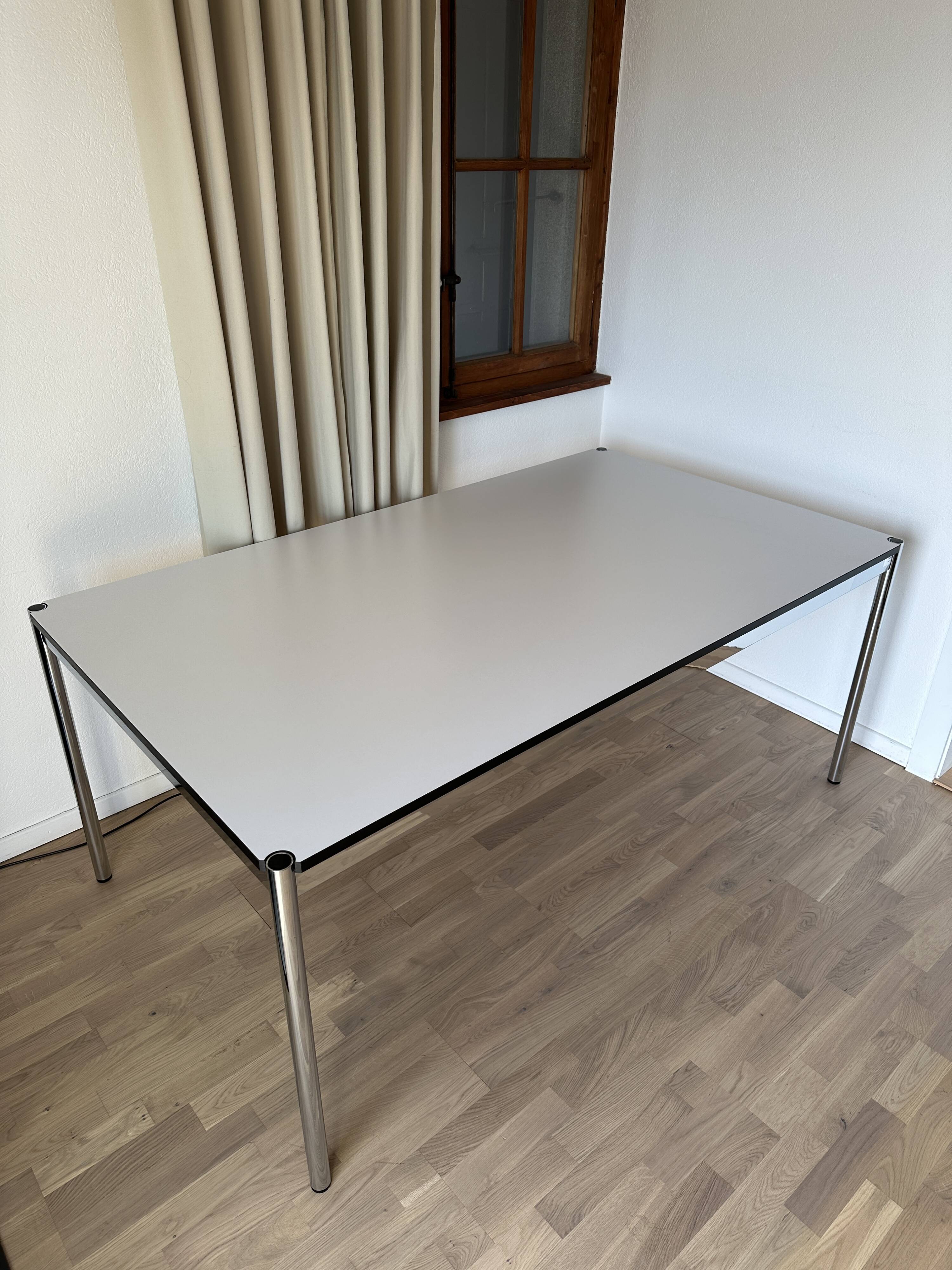 USM Haller desk in pearl grey laminate