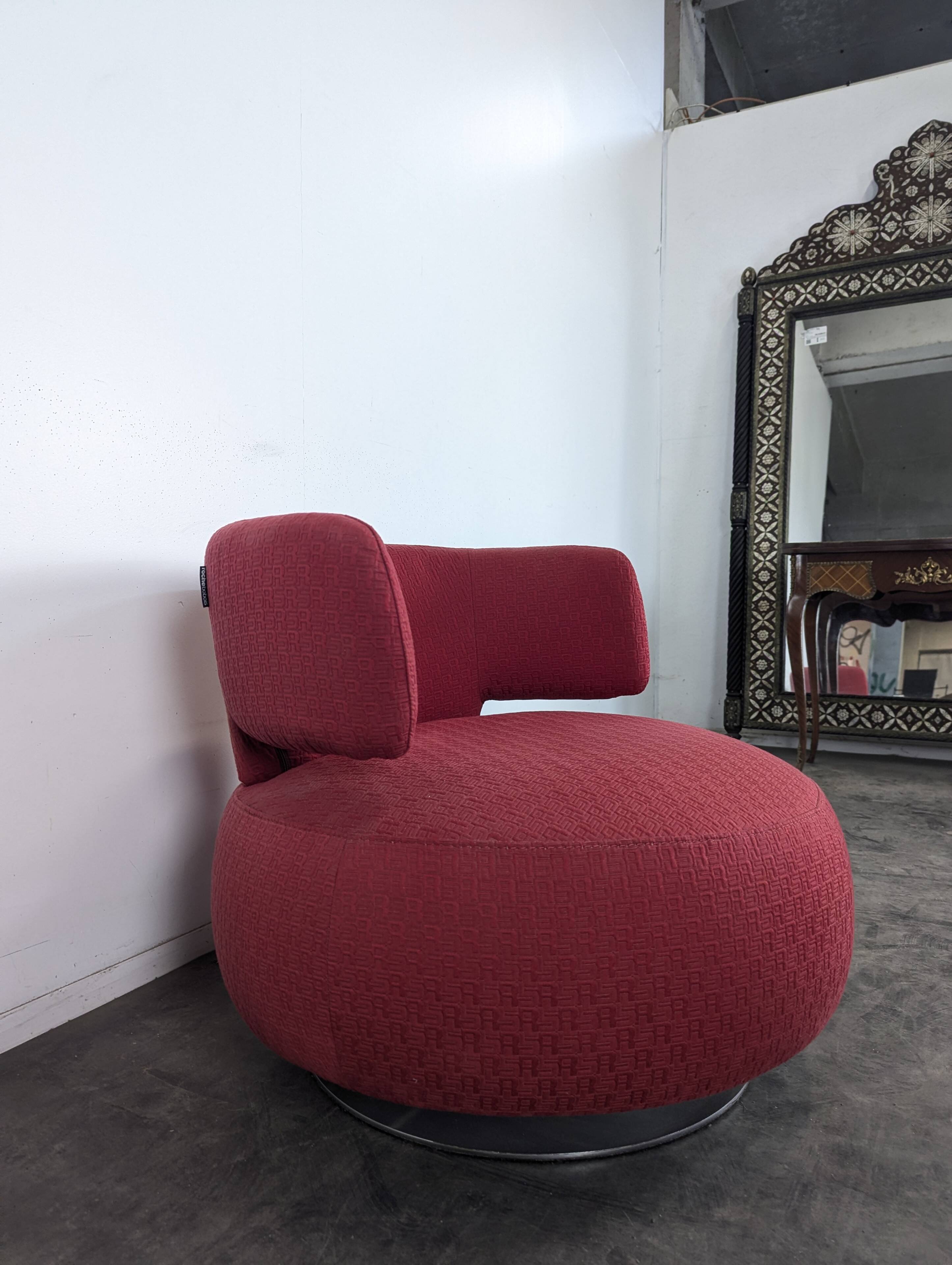 Roche Bobois swivel chair in red fabric with 2000s patterns.
