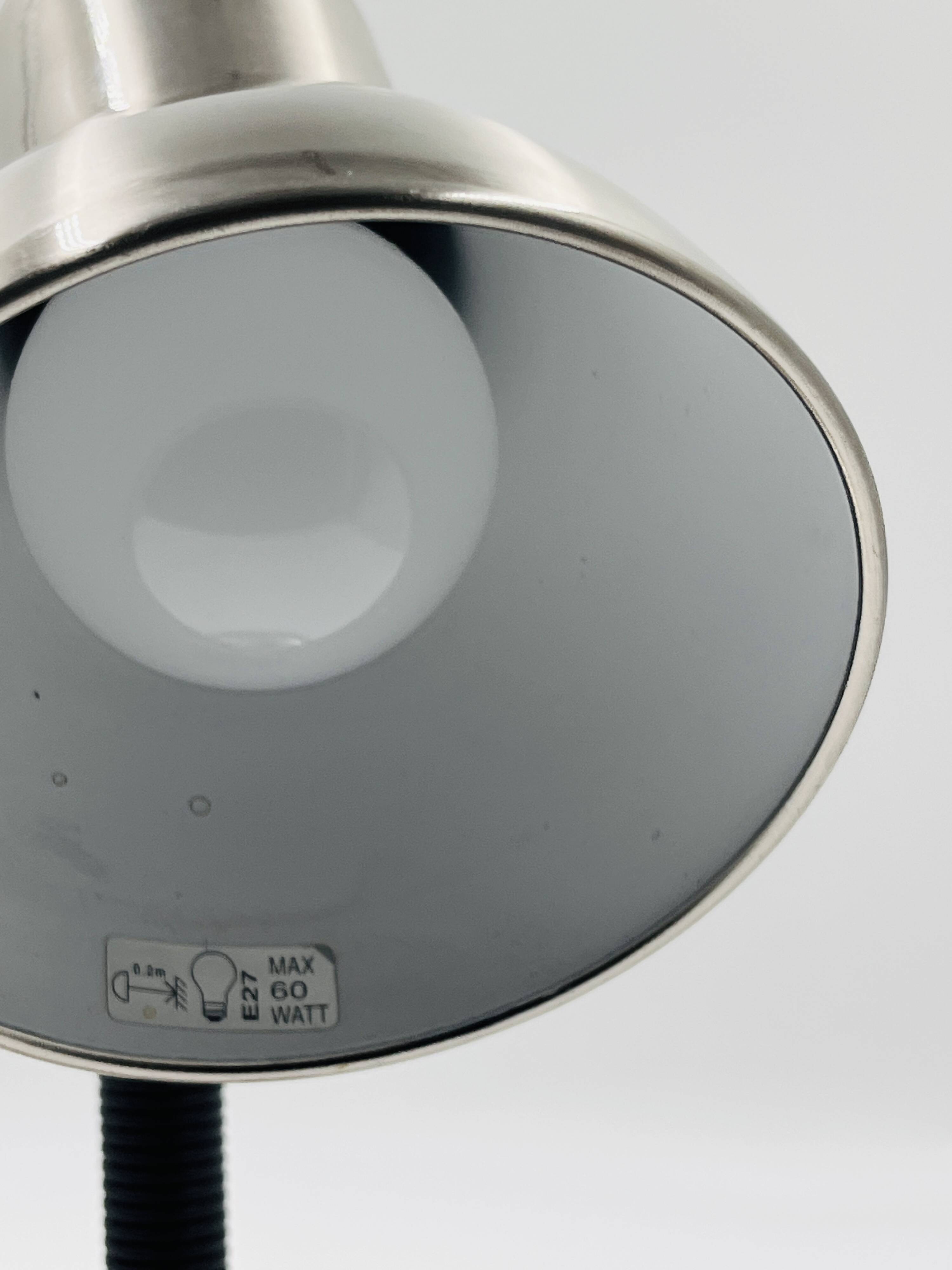 Brushed stainless steel lamp from the 90s