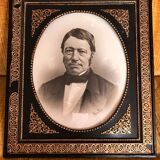 Black and gilded ebonite frame, wood and plaster 19th century