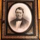 Black and gilded ebonite frame, wood and plaster 19th century