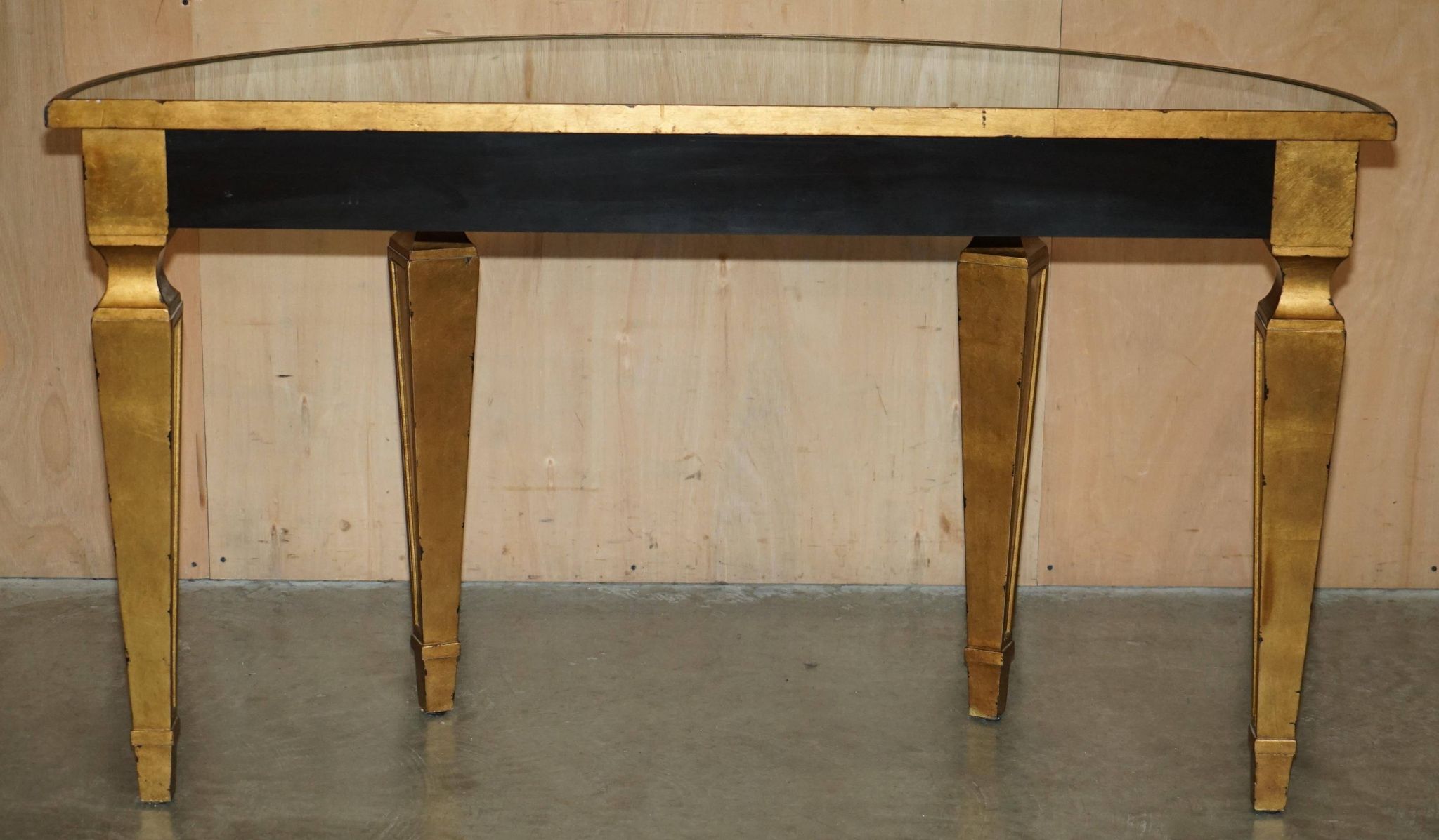 Half-moon console Eglomise Theodore Alexander with a gold finish.
