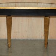 Half-moon console Eglomise Theodore Alexander with a gold finish.