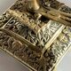 Patterned solid bronze hand candle holder