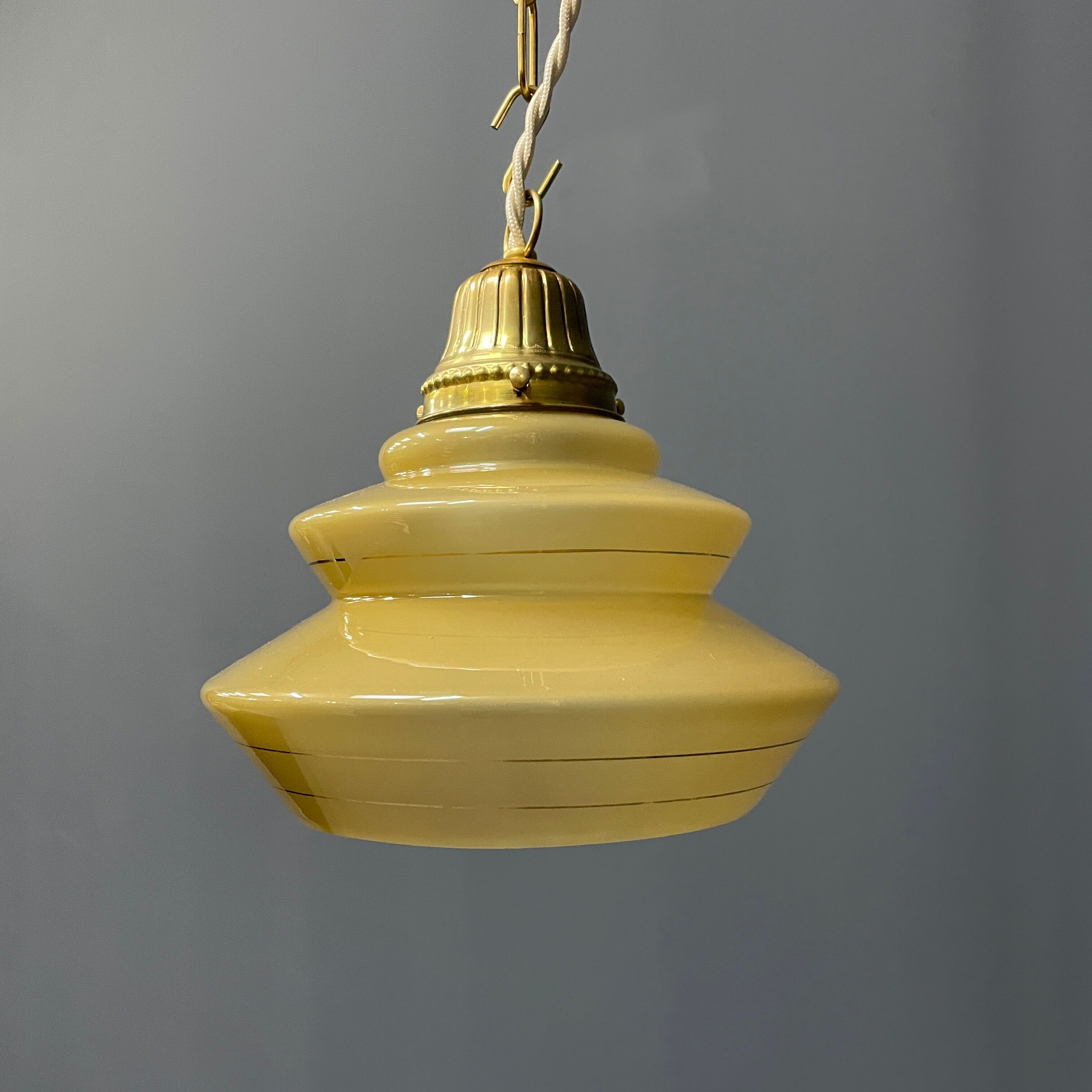 Vintage ocher glass hanging lamps with brass gallery