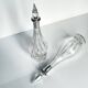 Pair of crystal decanters with solid silver mounts