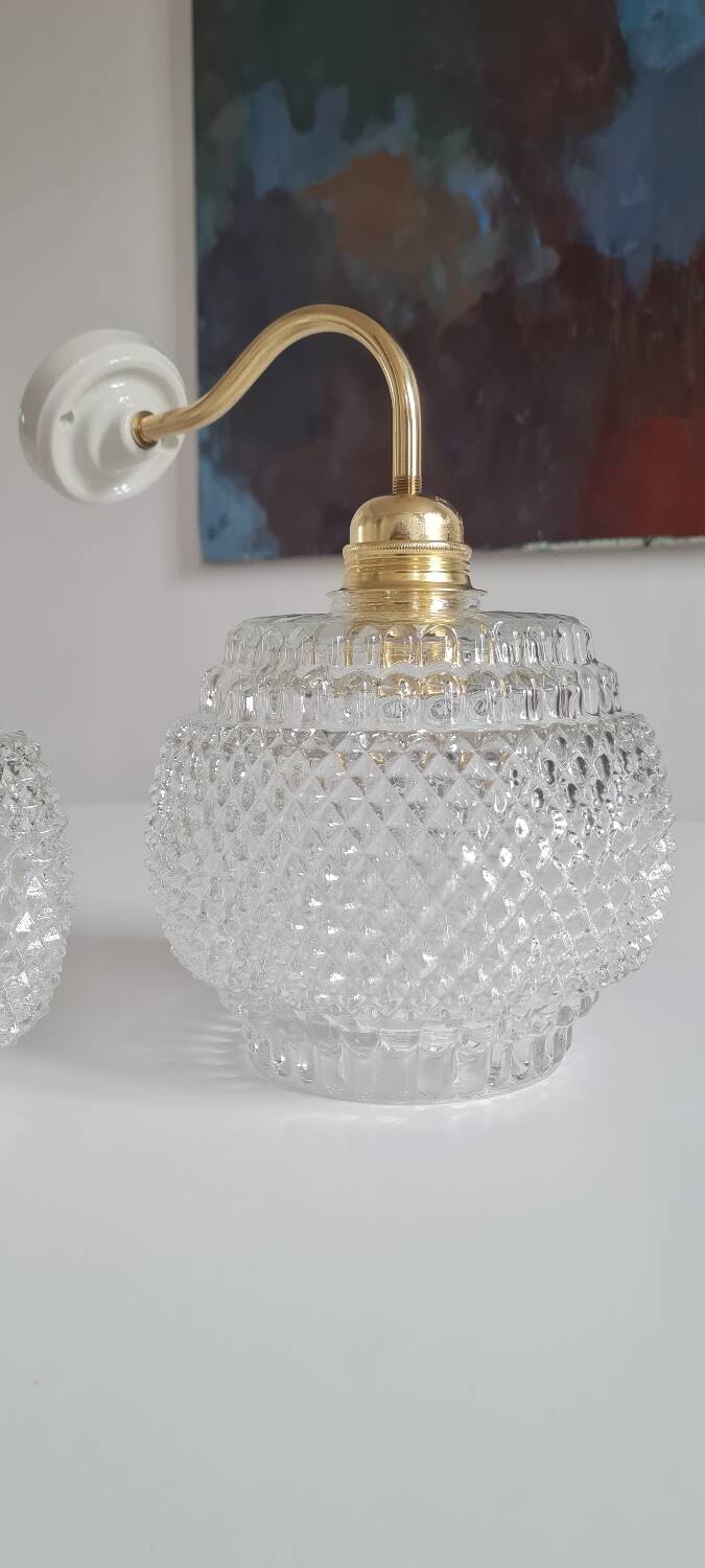 Pair of chiseled glass sconces
