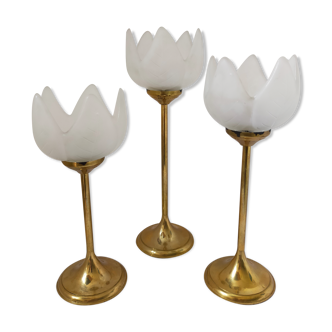 Trio of standing brass candle holders and frosted glass flowers and vintage chisels