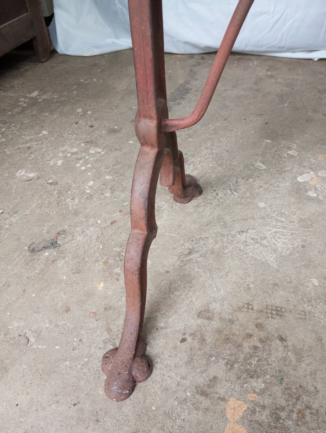 Antique bistro table with lion paws