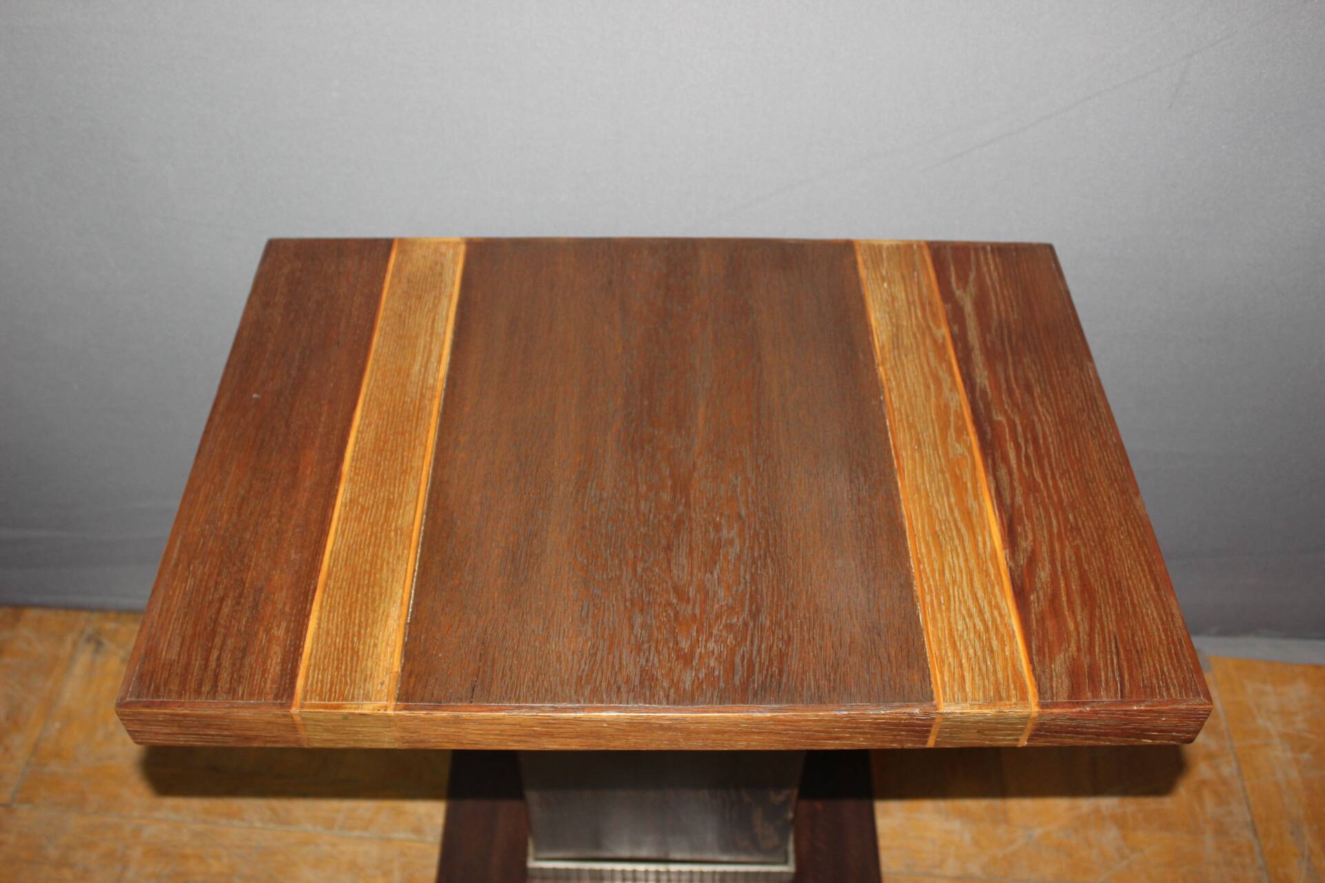 Art Deco period pedestal table in oak and nickel-plated bronze circa 1930