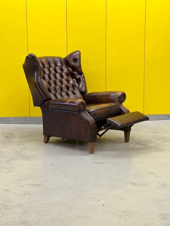 Brown vintage handmade chesterfield recliner armchair