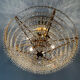 Chandelier cascade of tassels and brass