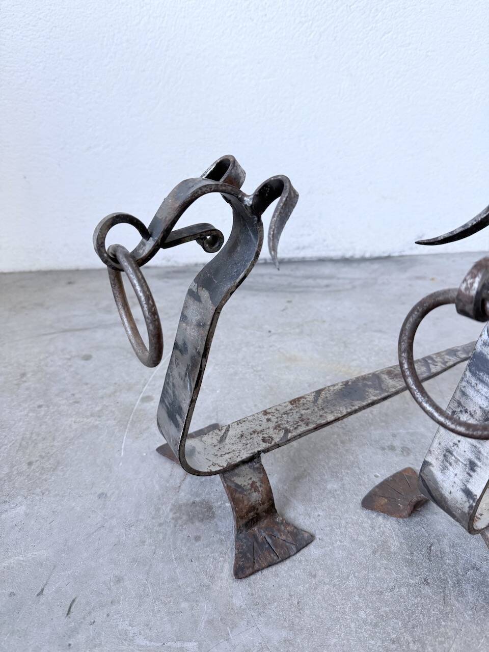 Pair of zoomorphic metal andirons "dogs" 1950