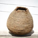 Old basket, burgundy straw and bramble, woven basket, interior decoration, pantry, flowerpot