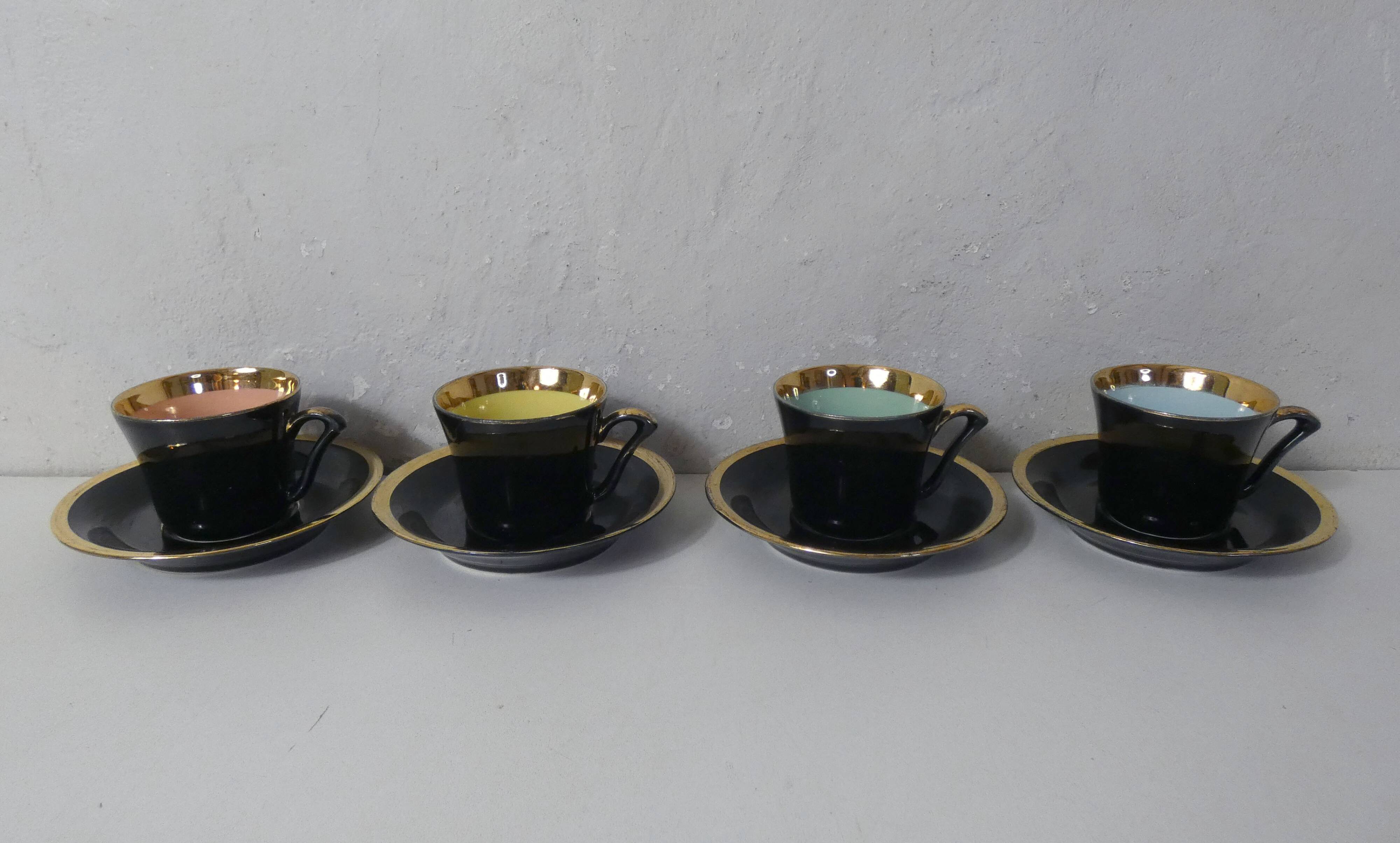 4 old black and gold cups in Vintage color