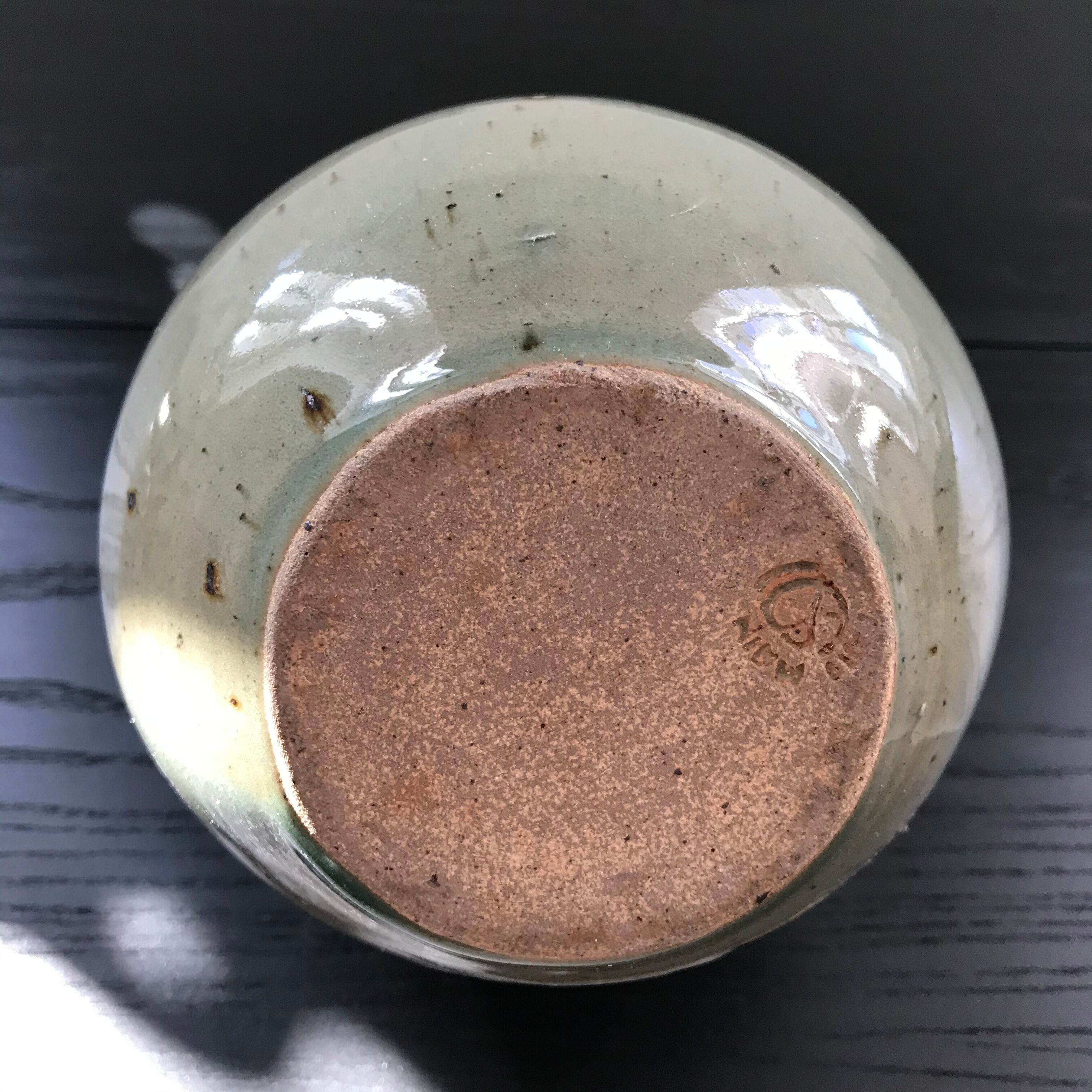 Hand has coarse salt in sandstone