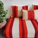 Set of covers for cream and red Moroccan floor sofa.