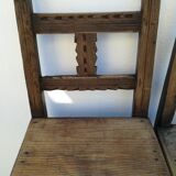 Pair of ethnic crude wooden chairs