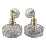 Pair of chiseled glass wall sconces