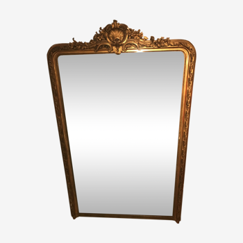 Miroir ancien à fleuron coquillage en bois et stuc doré