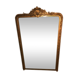 Large antique mirror with flagship shell in wood and gilded stucco