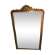 Large antique mirror with flagship shell in wood and gilded stucco