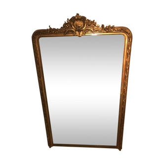 Miroir ancien à fleuron coquillage en bois et stuc doré
