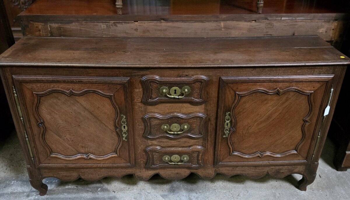 Louis XV oak buffet in enfilade style.