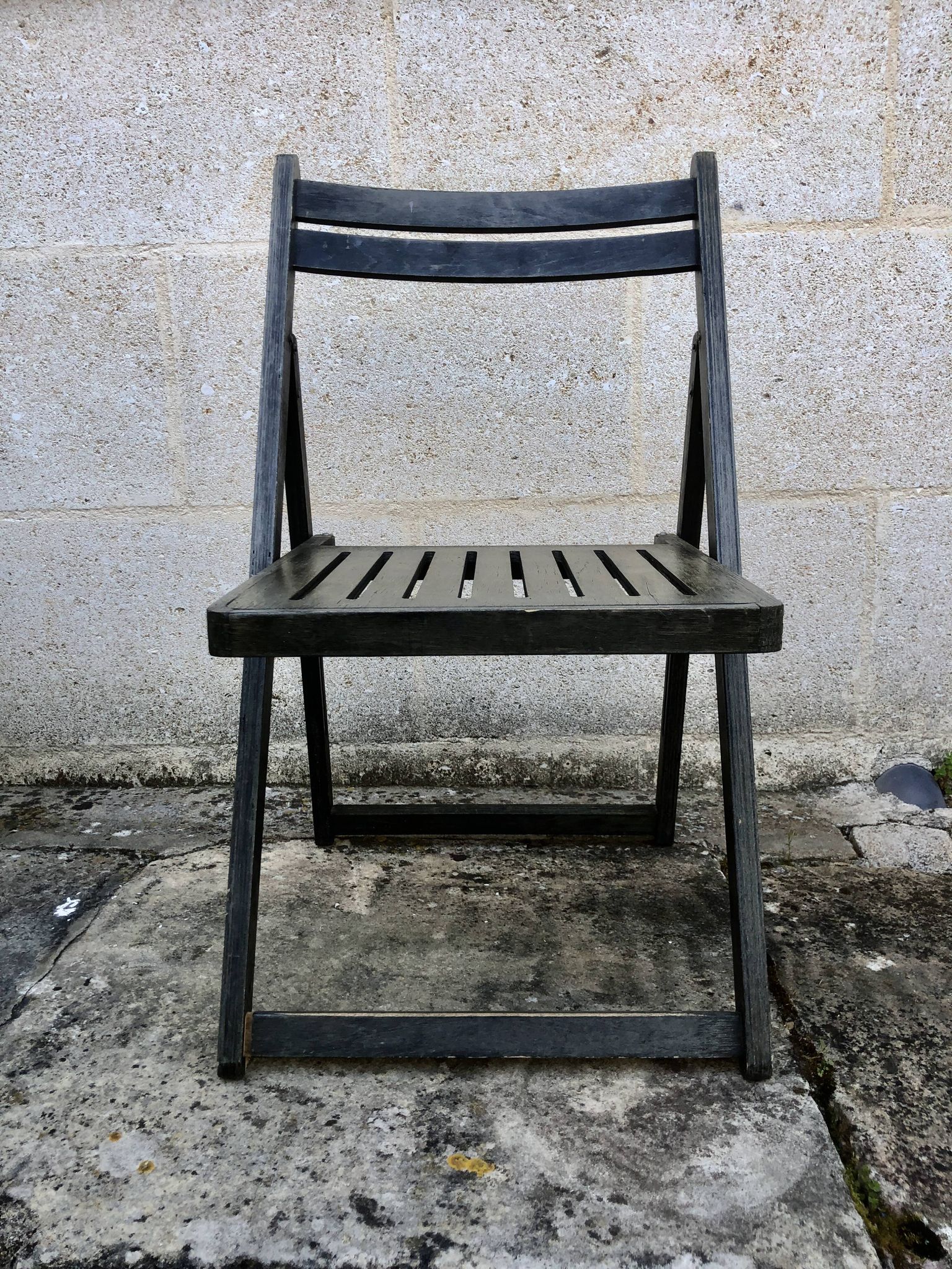 Black wooden folding chair