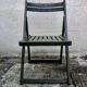 Black wooden folding chair