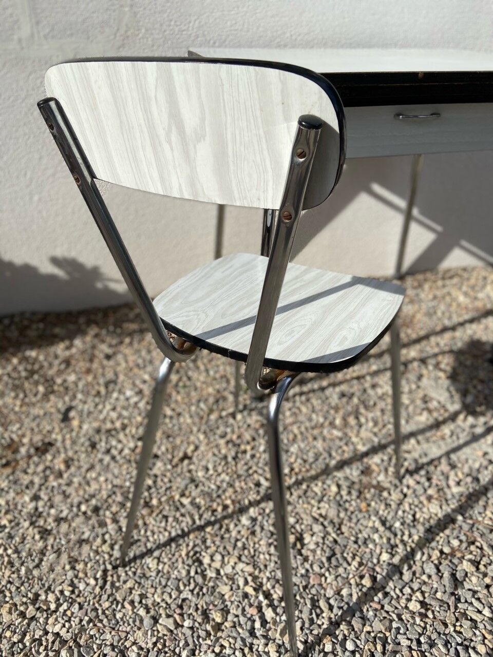 White formica table with chair