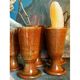 Five ancient potter's mazagrans in enamelled sandstone