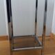 Chrome metal and smoked glass console