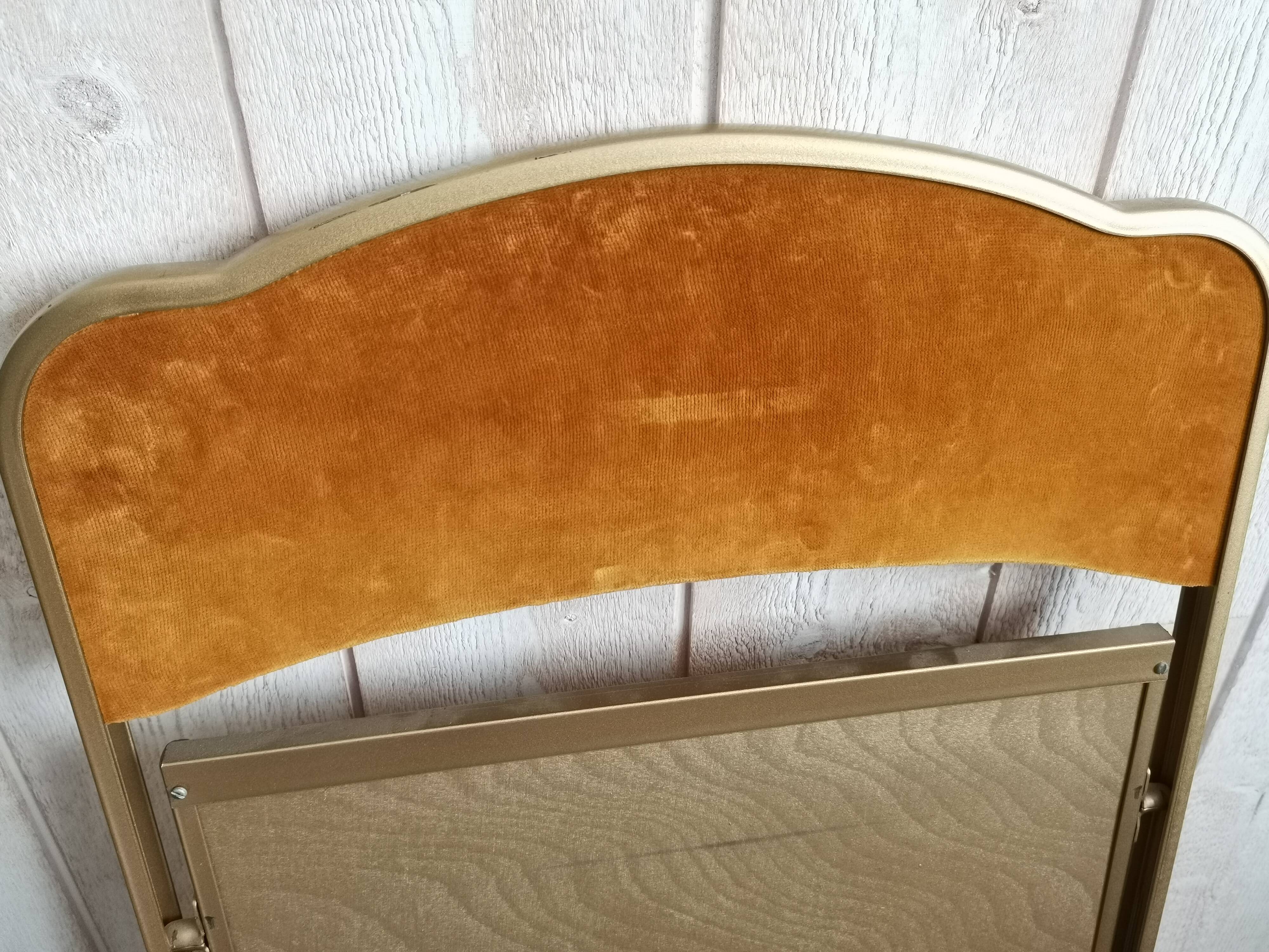 Two gold velvet chairs