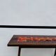 French console table with tiles, by Robert Picault.