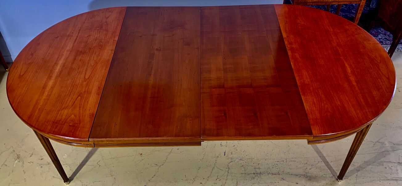 Louis XVI style table in cherry with 2 extensions