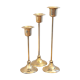 Trio of brass candlesticks