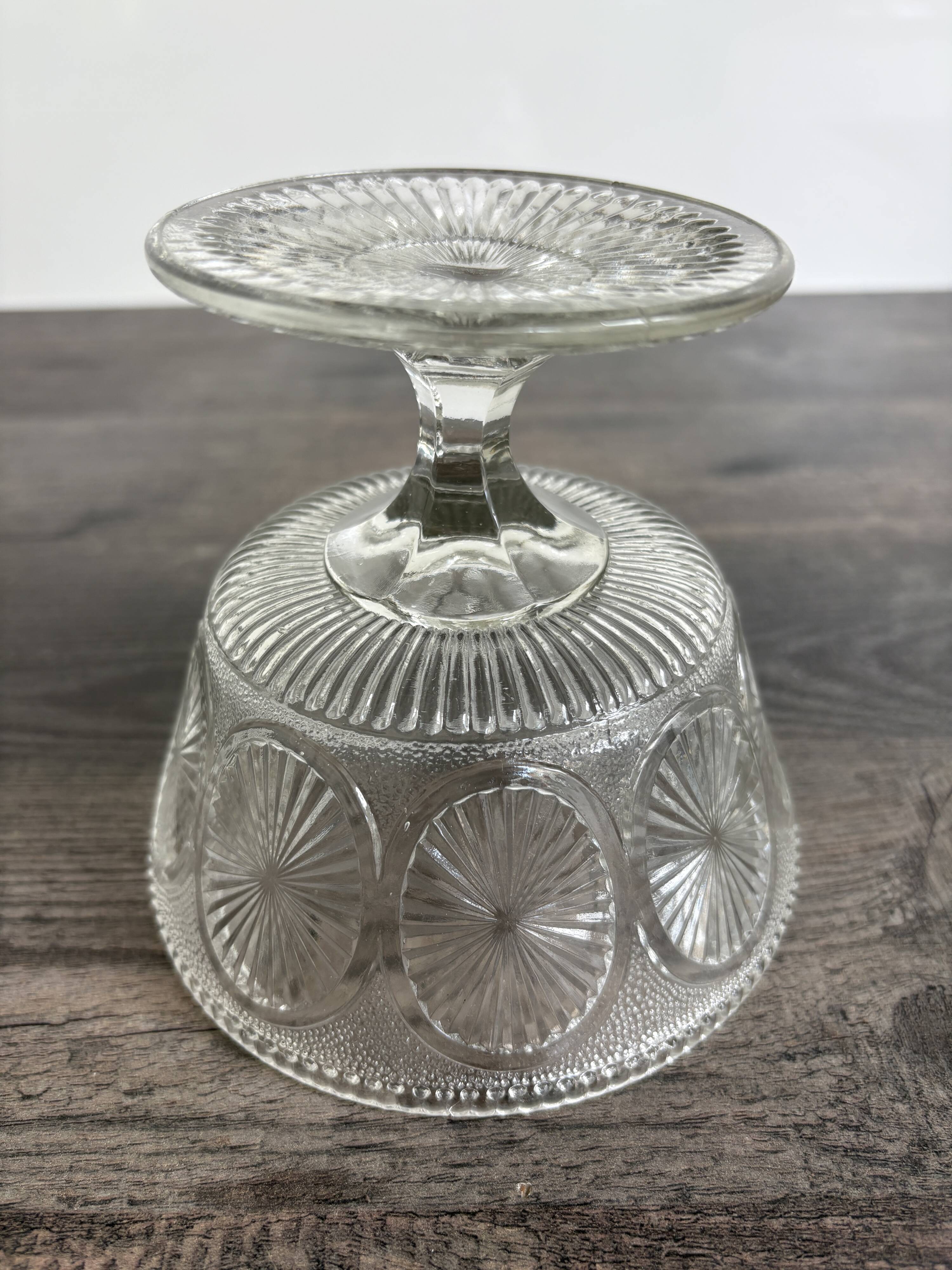 Antique glass bowl on pedestal