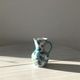 Ceramic vase pitcher with handles. Floral decoration, made in Italy.