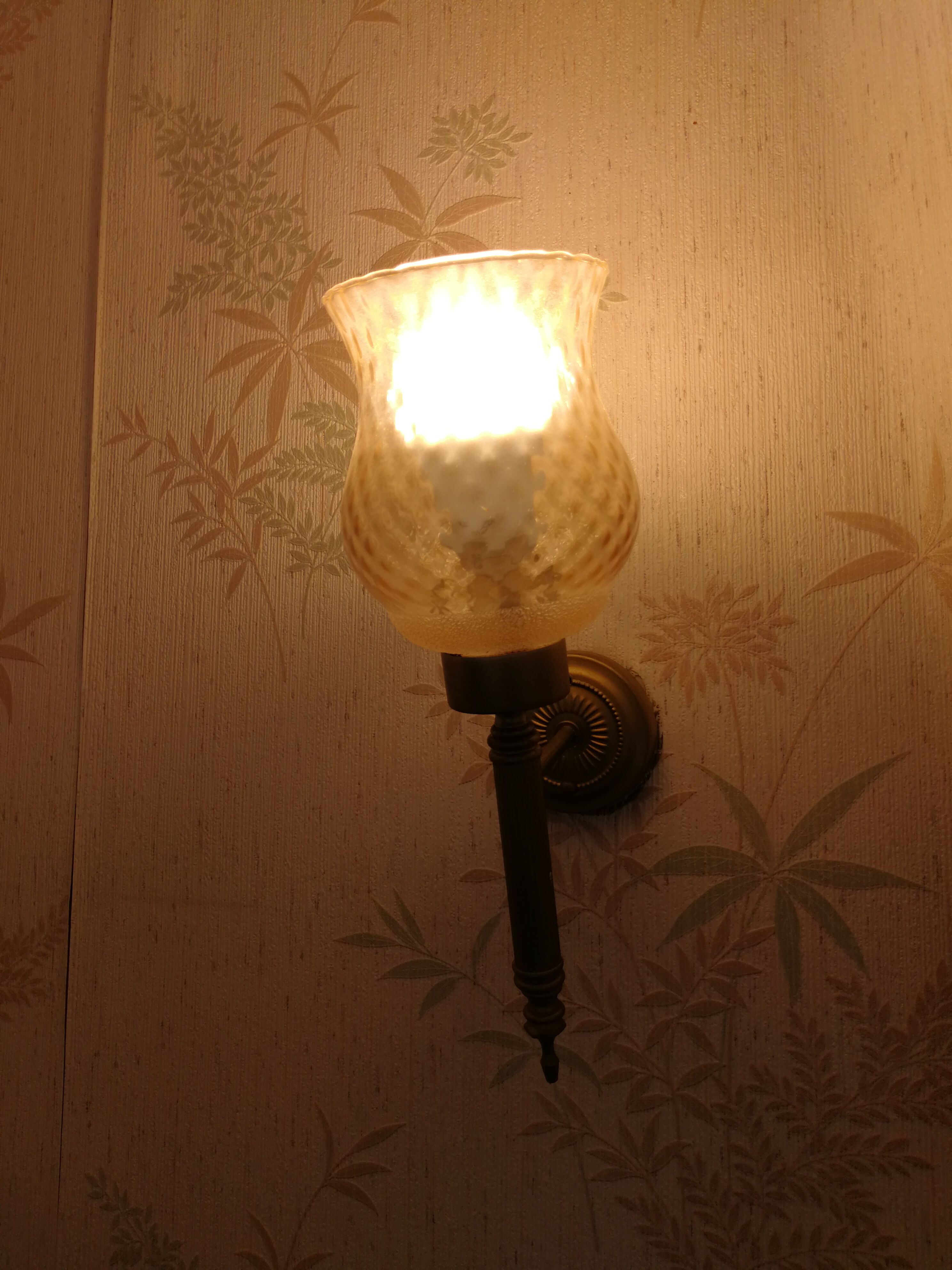 Glass and brass sconces