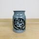 Vintage 1960s ceramic vase, abstract patterns.