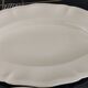2 oval raviers Sarreguemines solid ivory color