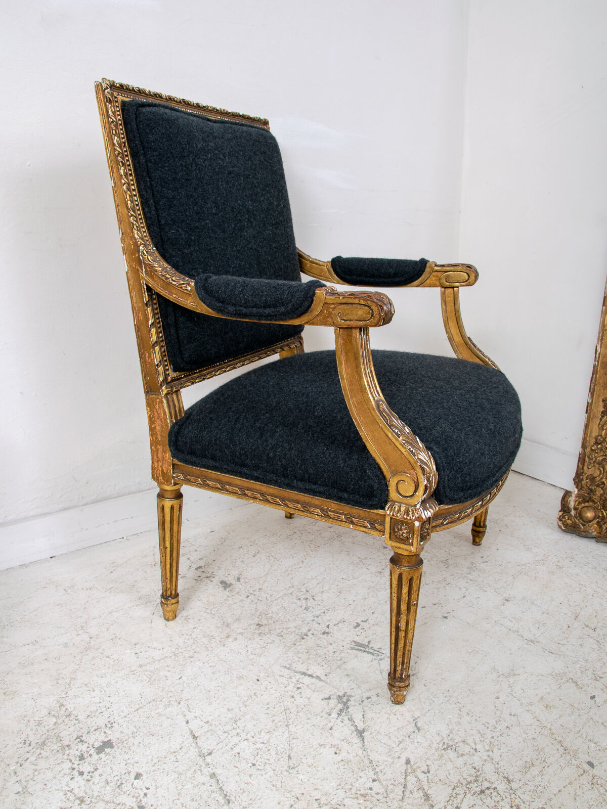 Pair of 19th century Louis XVI gilt armchairs newly re upholstered in holland and sherry fabric